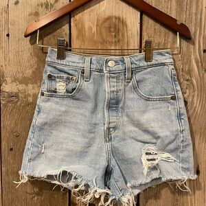 Levi’s Light Blue Jean Shorts with Distressed Details and Frayed Hem